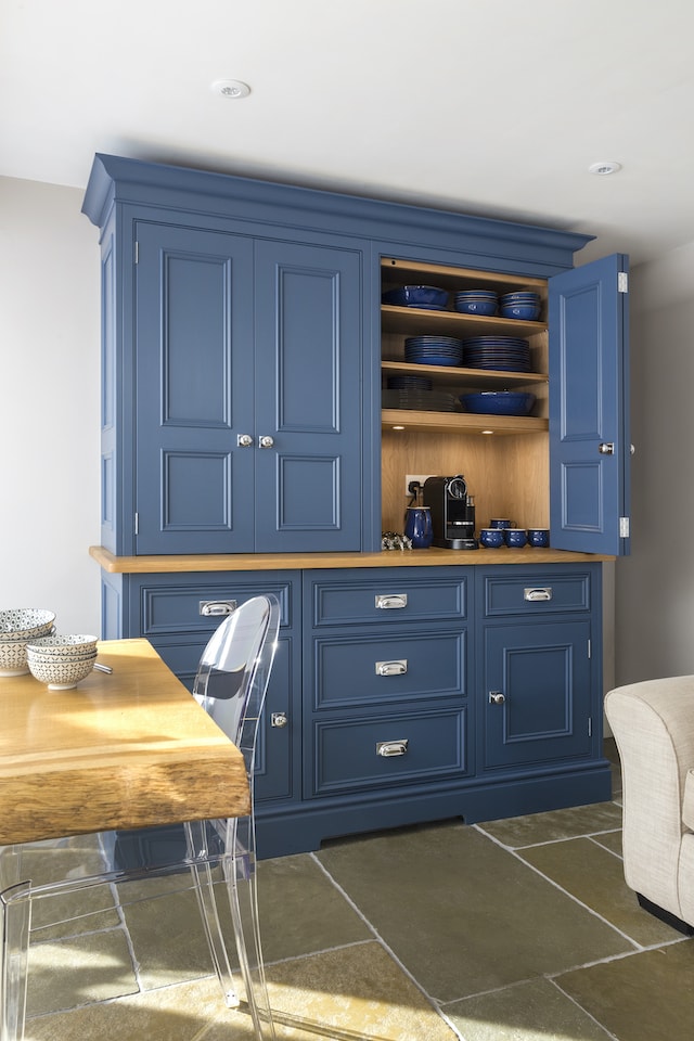 freestanding blue larder cupboard door open